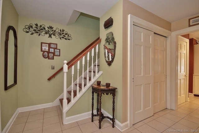2 Tamshell Dr, Kent, CT 06757 - entryway featuring light tile patterned flooring, stairway, and baseboards