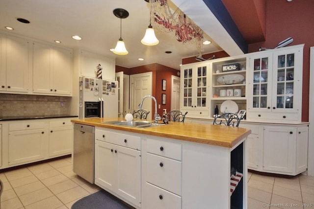 2 Tamshell Dr, Kent, CT 06757 - kitchen featuring a sink, light tile patterned flooring, dishwasher, white refrigerator with ice dispenser, and white cabinetry