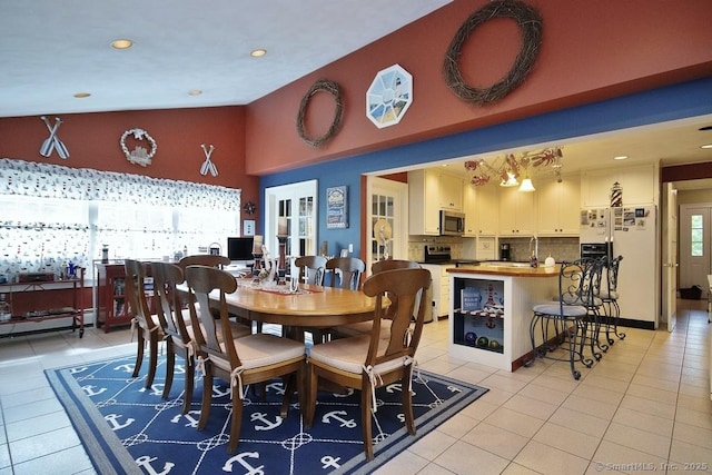 2 Tamshell Dr, Kent, CT 06757 - dining room with light tile patterned floors, high vaulted ceiling, and recessed lighting