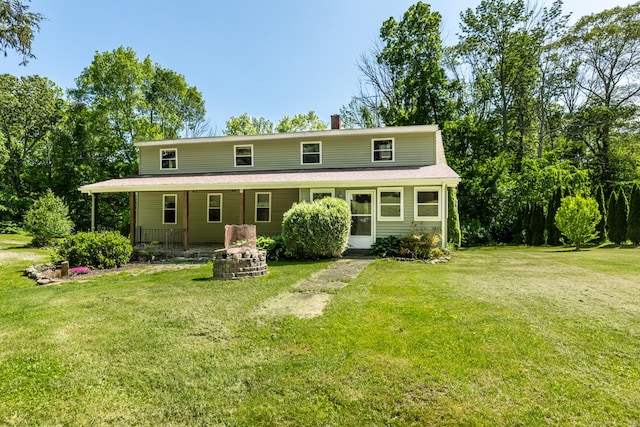23 Ross Rd, Preston, CT 06365 - rear view of house with a yard, a porch, and a chimney