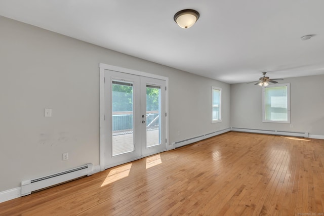 23 Ross Rd, Preston, CT 06365 - spare room featuring baseboard heating, french doors, light wood-style floors, and plenty of natural light