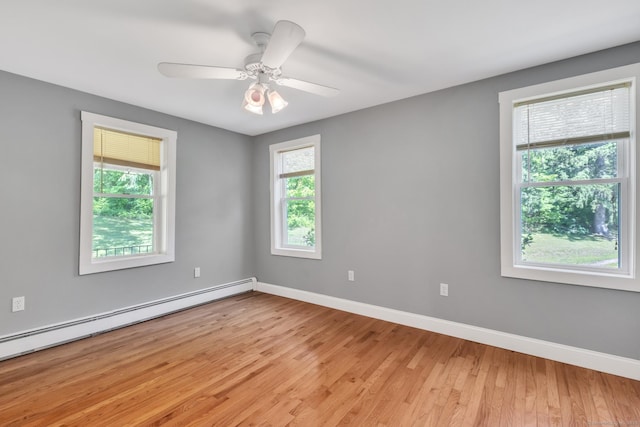 23 Ross Rd, Preston, CT 06365 - empty room with a baseboard heating unit, light wood-style floors, baseboards, and ceiling fan