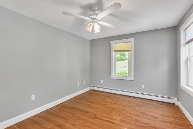 23 Ross Rd, Preston, CT 06365 - empty room with baseboard heating, plenty of natural light, and light wood finished floors