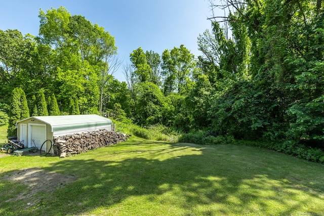 23 Ross Rd, Preston, CT 06365 - view of grassy yard with an outbuilding and a detached garage