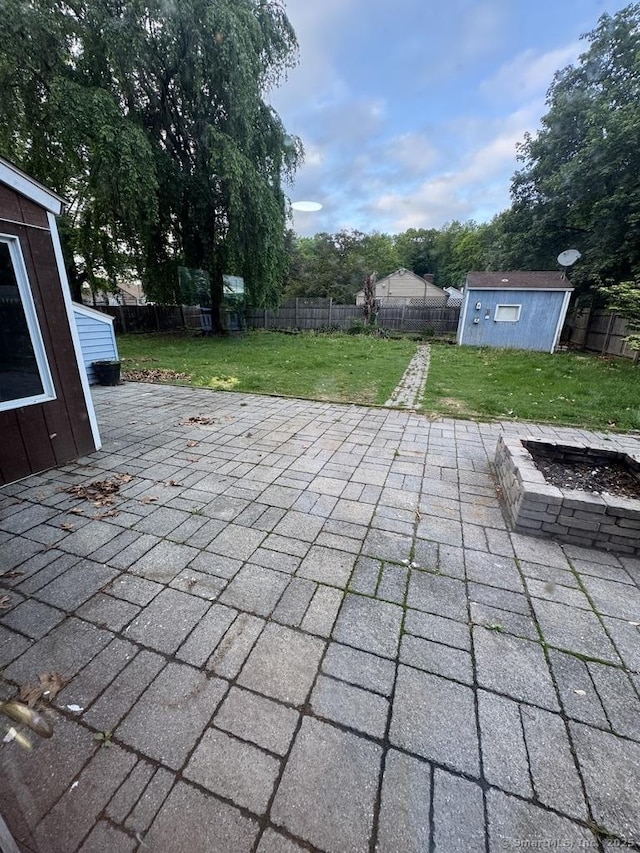 1 Stoughton Rd, Southington, CT 06489 - view of patio featuring an outdoor fire pit