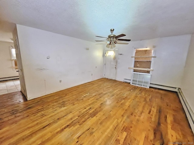 270 Capen St, Hartford, CT 06112 - unfurnished room with light wood-type flooring, a ceiling fan, baseboard heating, and a textured ceiling