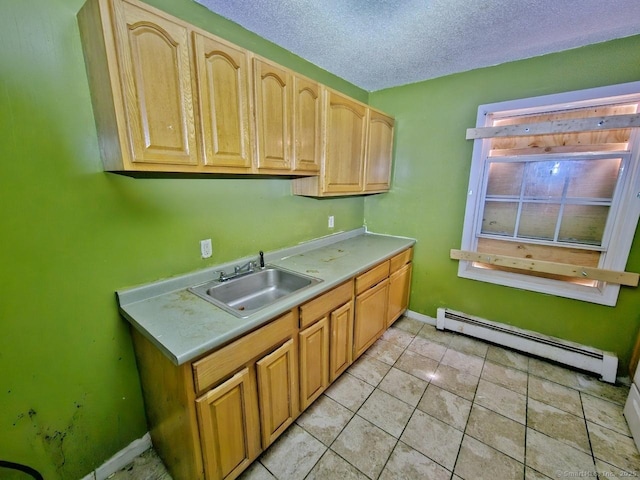 270 Capen St, Hartford, CT 06112 - kitchen featuring a sink, baseboard heating, light countertops, light tile patterned floors, and a textured ceiling