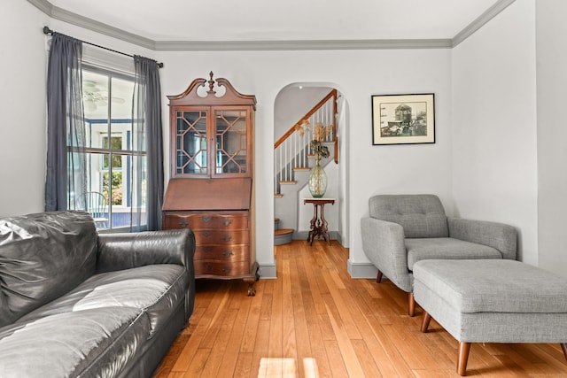 5 Maple Corners Rd, Ledyard, CT 06335 - living room with light wood-style flooring, stairway, ornamental molding, and arched walkways