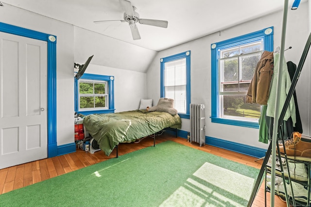 5 Maple Corners Rd, Ledyard, CT 06335 - bedroom with radiator heating unit, lofted ceiling, wood finished floors, multiple windows, and ceiling fan