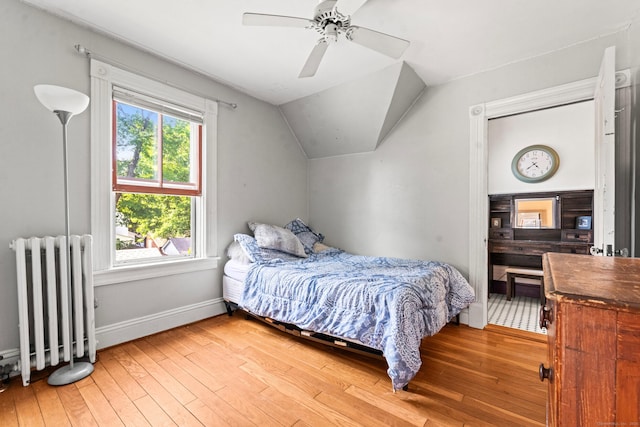 5 Maple Corners Rd, Ledyard, CT 06335 - bedroom featuring radiator heating unit, vaulted ceiling, baseboards, hardwood / wood-style floors, and ceiling fan