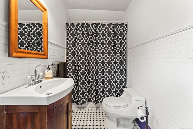 5 Maple Corners Rd, Ledyard, CT 06335 - bathroom featuring vanity, toilet, wood walls, wainscoting, and tile patterned floors
