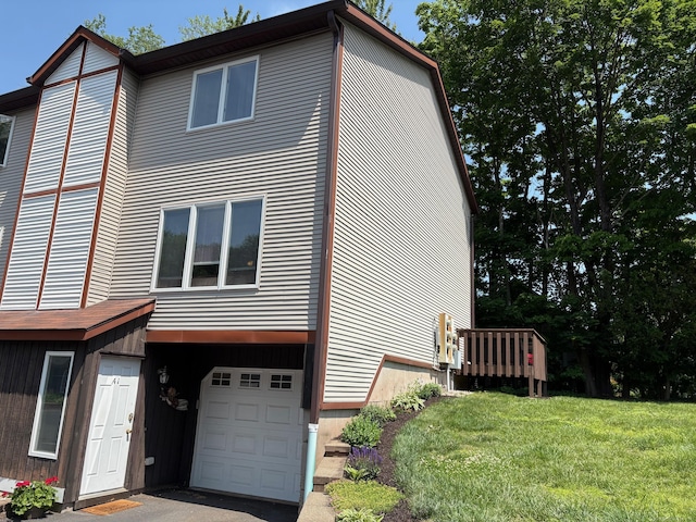 97 Dallas Ave Apt A1, Plainville, CT 06062 - view of front of house featuring an attached garage and a front yard