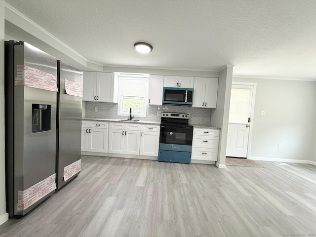 40 Cherry St, Hartford, CT 06106 - kitchen with black range with electric stovetop, stainless steel refrigerator with ice dispenser, light wood-type flooring, a textured ceiling, and tasteful backsplash