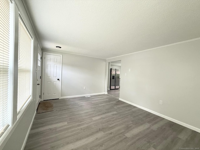 40 Cherry St, Hartford, CT 06106 - unfurnished room with wood finished floors, a textured ceiling, and crown molding