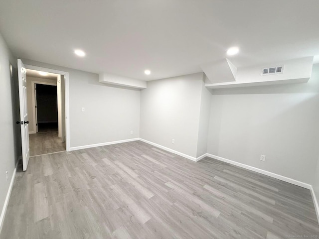40 Cherry St, Hartford, CT 06106 - finished basement with recessed lighting and light wood finished floors