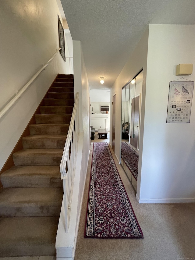 268 Hartford Tpke Apt A2, Tolland, CT 06084 - staircase with carpet floors and baseboards