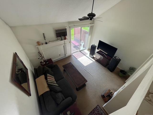 268 Hartford Tpke Apt A2, Tolland, CT 06084 - living area with lofted ceiling, ceiling fan, carpet, a wall mounted AC, and baseboard heating