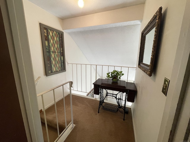 268 Hartford Tpke Apt A2, Tolland, CT 06084 - hall with carpet flooring, an upstairs landing, and a textured ceiling