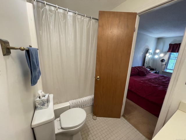 268 Hartford Tpke Apt A2, Tolland, CT 06084 - full bath featuring ensuite bathroom, toilet, tile patterned flooring, shower / tub combo, and a textured ceiling