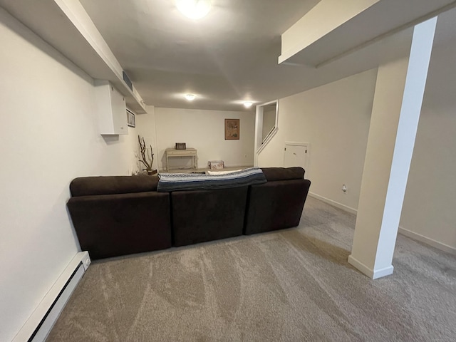 268 Hartford Tpke Apt A2, Tolland, CT 06084 - living area with carpet floors, a baseboard heating unit, and baseboards