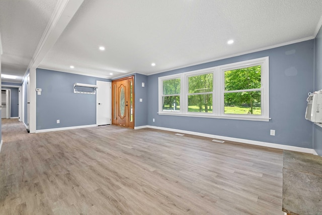157 Mile Creek Rd, Old Lyme, CT 06371 - unfurnished living room featuring light wood-type flooring, ornamental molding, and recessed lighting