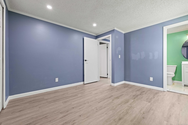 157 Mile Creek Rd, Old Lyme, CT 06371 - unfurnished bedroom featuring wood finished floors, ornamental molding, a textured ceiling, recessed lighting, and connected bathroom