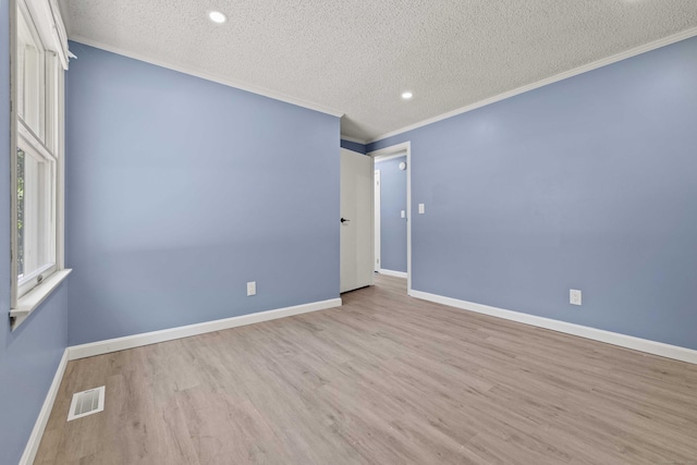 157 Mile Creek Rd, Old Lyme, CT 06371 - empty room featuring a textured ceiling, wood finished floors, ornamental molding, and recessed lighting