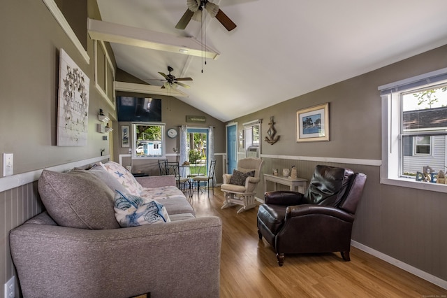 45 E St, Madison, CT 06443 - living room featuring a ceiling fan, wood finished floors, healthy amount of natural light, vaulted ceiling, and wainscoting