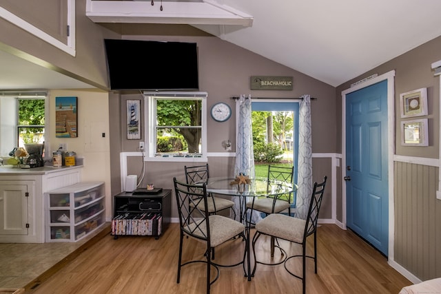 45 E St, Madison, CT 06443 - dining room featuring light wood-style floors, vaulted ceiling, and wainscoting