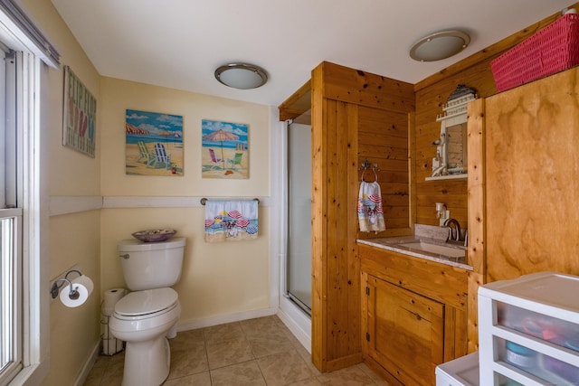 45 E St, Madison, CT 06443 - full bath with vanity, toilet, a stall shower, tile patterned floors, and baseboards