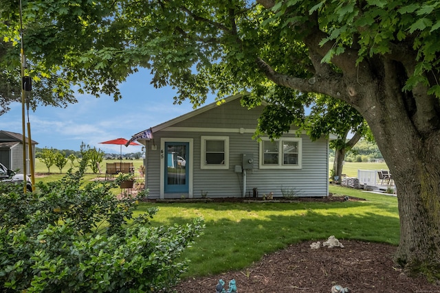 45 E St, Madison, CT 06443 - rear view of house featuring a yard