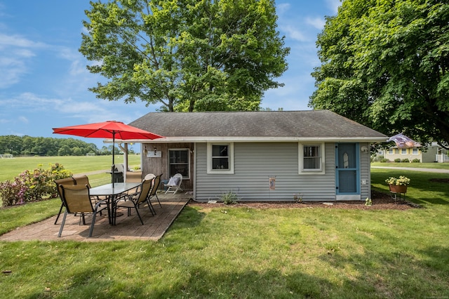 45 E St, Madison, CT 06443 - back of house with a patio, a yard, and a shingled roof