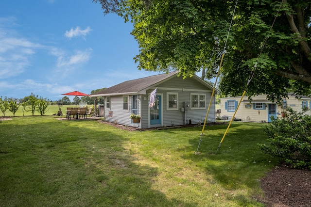 45 E St, Madison, CT 06443 - rear view of house with a yard