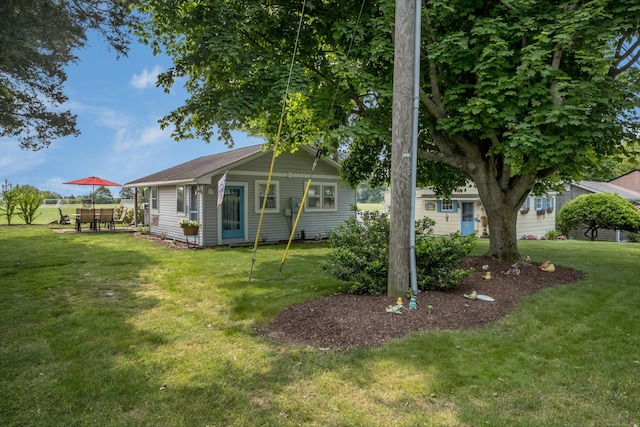 45 E St, Madison, CT 06443 - rear view of house with a lawn