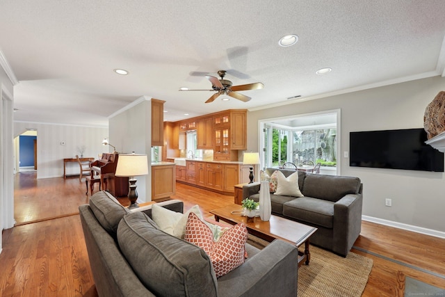 20 Cherry Ln, Madison, CT 06443 - living area with ornamental molding, a ceiling fan, baseboards, light wood-type flooring, and recessed lighting