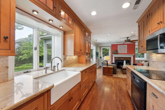 20 Cherry Ln, Madison, CT 06443 - kitchen featuring black appliances, a sink, light wood-type flooring, recessed lighting, and a fireplace