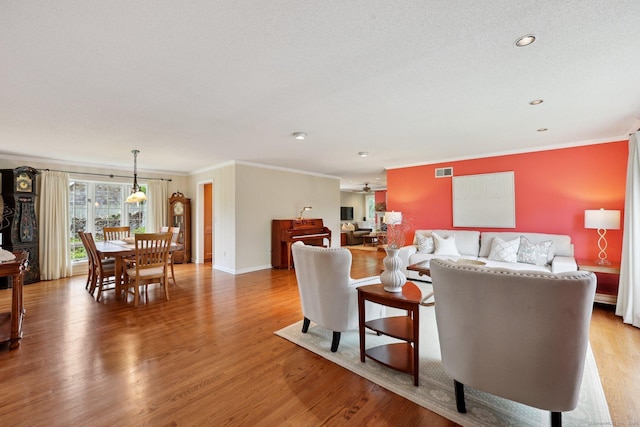 20 Cherry Ln, Madison, CT 06443 - living room featuring crown molding, light wood finished floors, baseboards, recessed lighting, and ceiling fan
