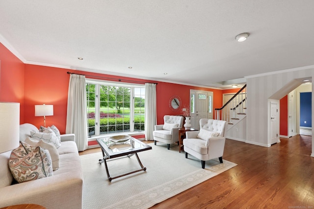 20 Cherry Ln, Madison, CT 06443 - living room featuring ornamental molding, wood finished floors, stairway, and baseboards