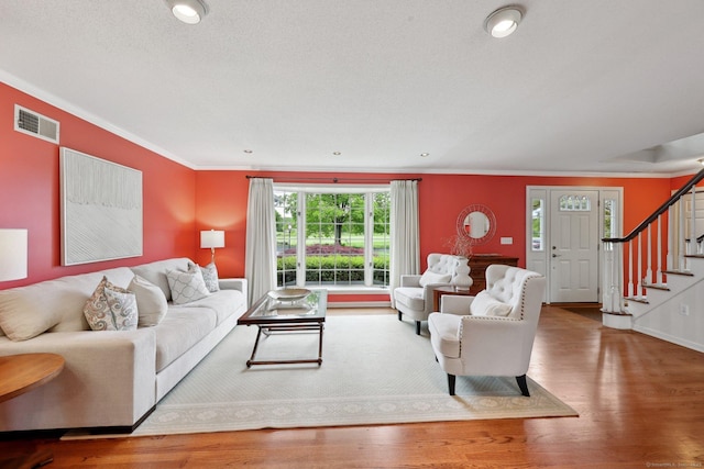 20 Cherry Ln, Madison, CT 06443 - living room with ornamental molding, stairway, wood finished floors, and baseboards