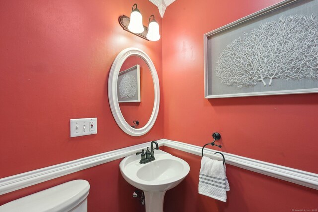 20 Cherry Ln, Madison, CT 06443 - bathroom with toilet and a sink