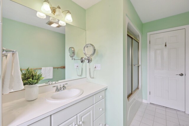 20 Cherry Ln, Madison, CT 06443 - full bathroom featuring tile patterned flooring, vanity, and shower / bath combination with glass door