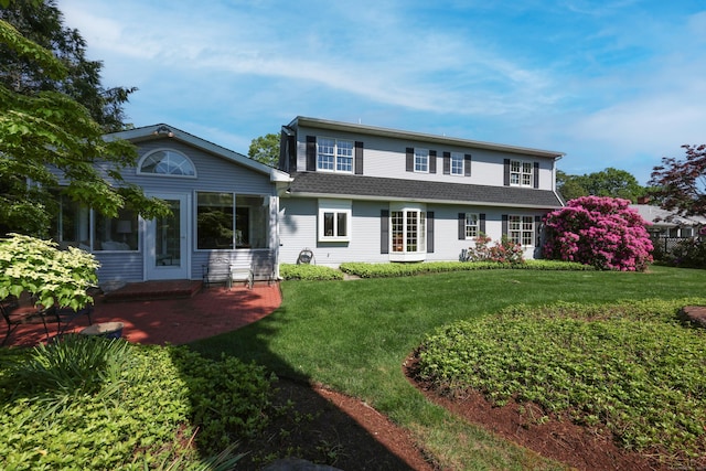 20 Cherry Ln, Madison, CT 06443 - rear view of house with a shingled roof and a yard
