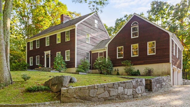 3 Dan Beard Ln, Redding, CT 06896 - colonial inspired home with a chimney, a front lawn, and a shingled roof