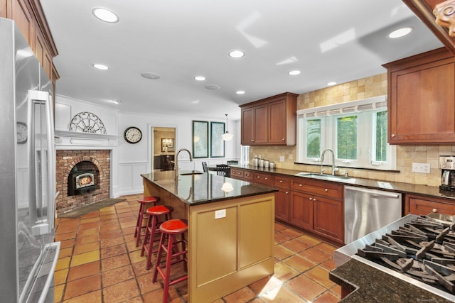 3 Dan Beard Ln, Redding, CT 06896 - kitchen featuring stainless steel appliances, a sink, tasteful backsplash, recessed lighting, and a wainscoted wall