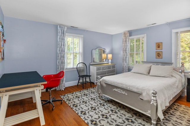 3 Dan Beard Ln, Redding, CT 06896 - bedroom featuring multiple windows, wood finished floors, and baseboards