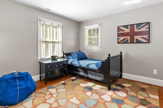 3 Dan Beard Ln, Redding, CT 06896 - bedroom with multiple windows, wood finished floors, and baseboards