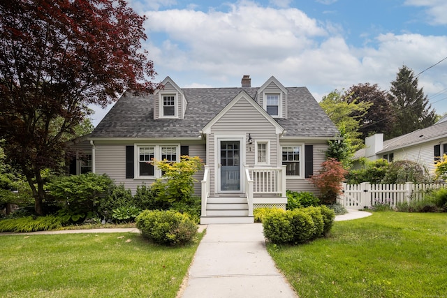 1 Yale Ave, Middlebury, CT 06762 - cape cod home featuring a chimney and roof with shingles