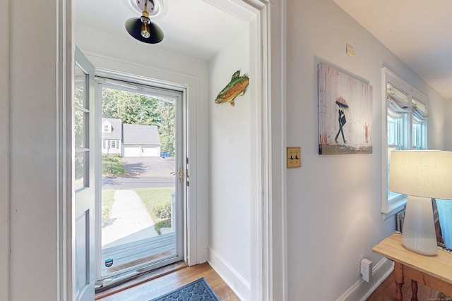 1 Yale Ave, Middlebury, CT 06762 - doorway to outside with baseboards and light wood-style flooring