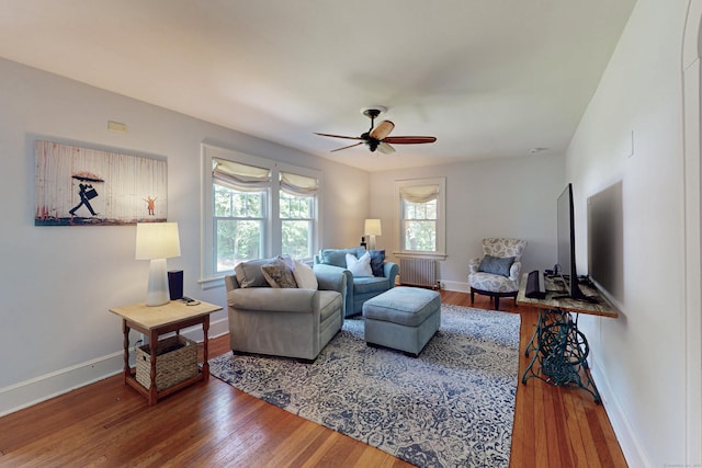 1 Yale Ave, Middlebury, CT 06762 - living room with radiator, hardwood / wood-style flooring, ceiling fan, and baseboards