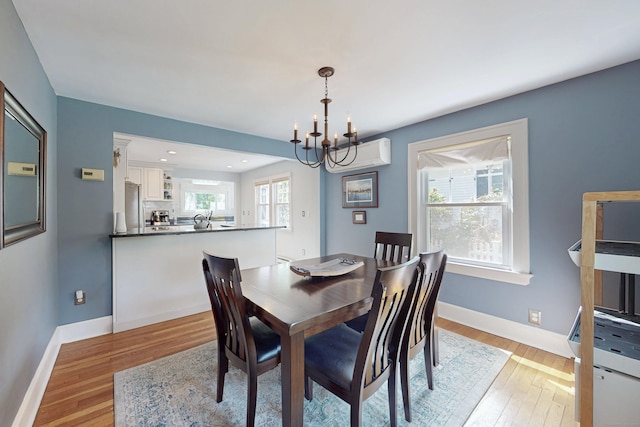 1 Yale Ave, Middlebury, CT 06762 - dining space featuring light wood-type flooring, a chandelier, plenty of natural light, baseboards, and recessed lighting